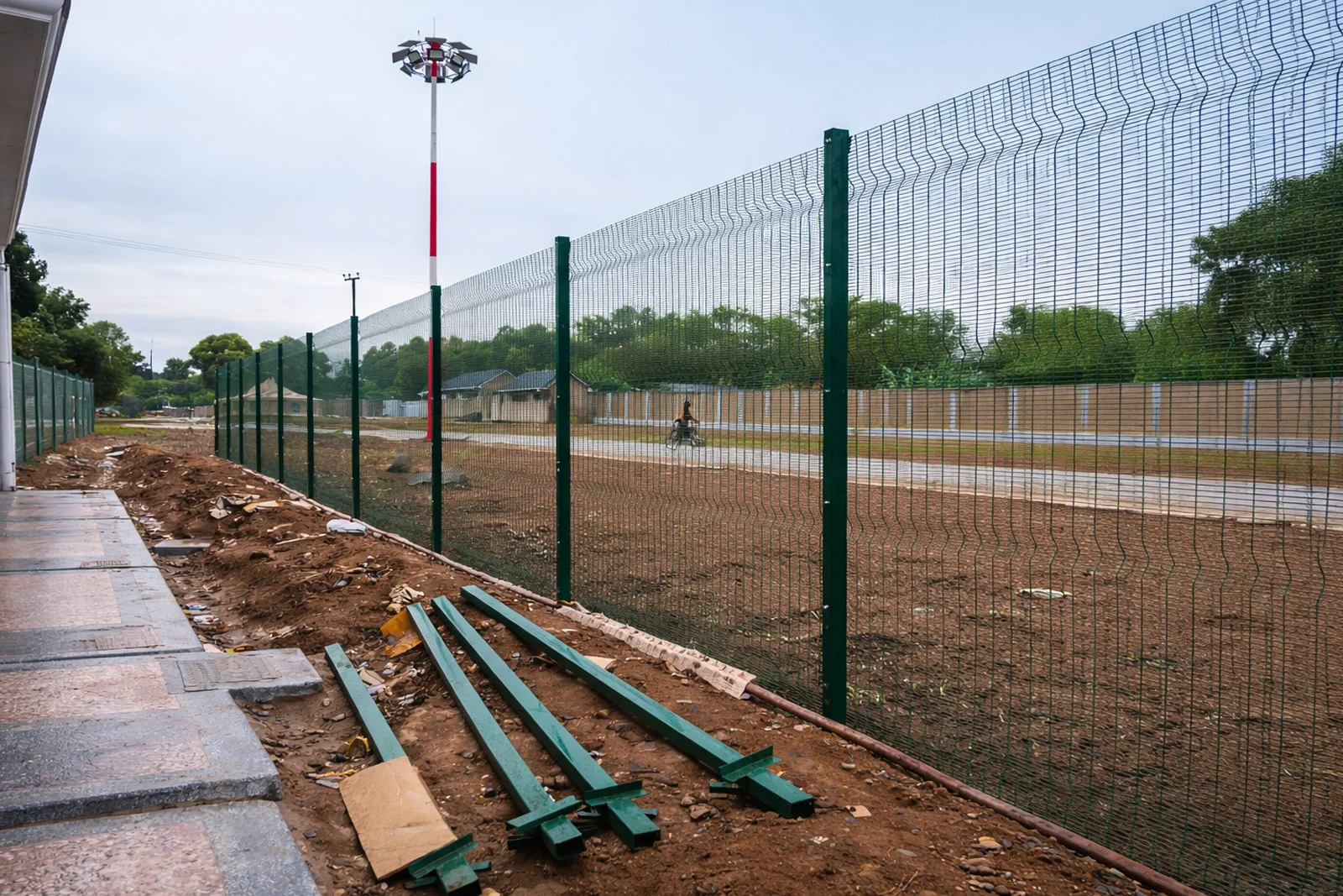 Anti-climb Clearview fencing installation around cottages and perimeter barrier in Bungoma Kenya