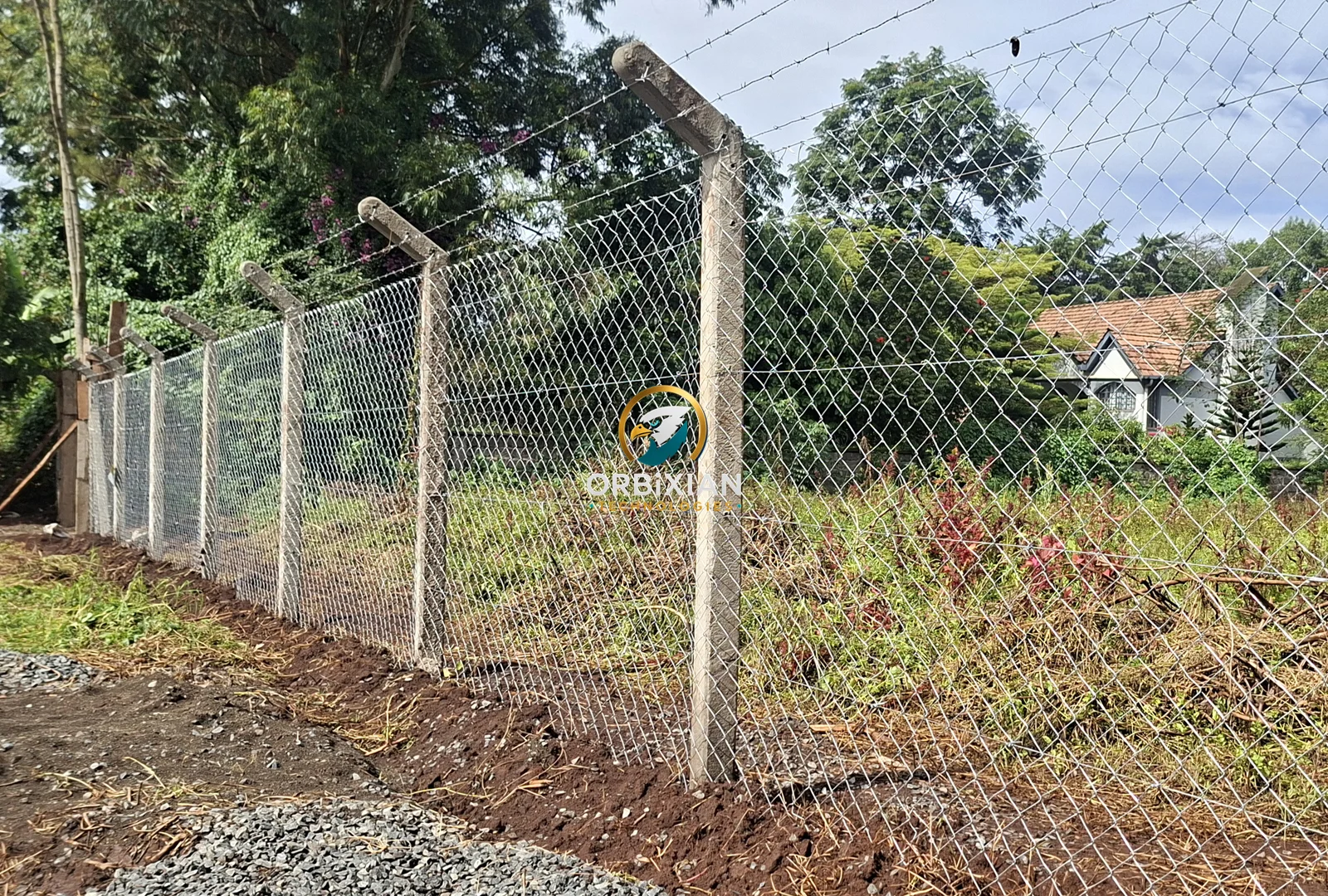 7ft G14 chainlink fence with barbed wire installed in Gachie Lower Kabete